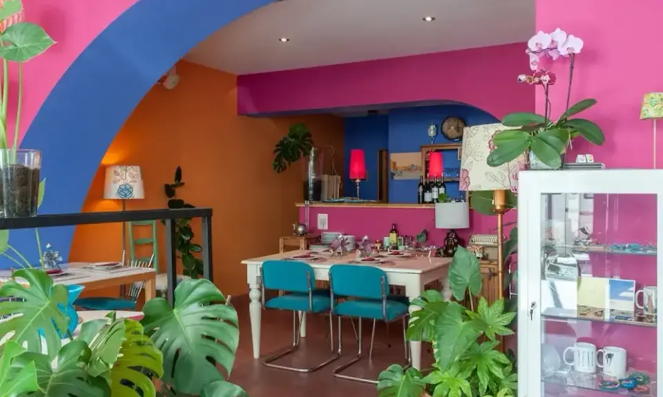 Colourful interior of Amaltea vegetarian restaurant in Córdoba