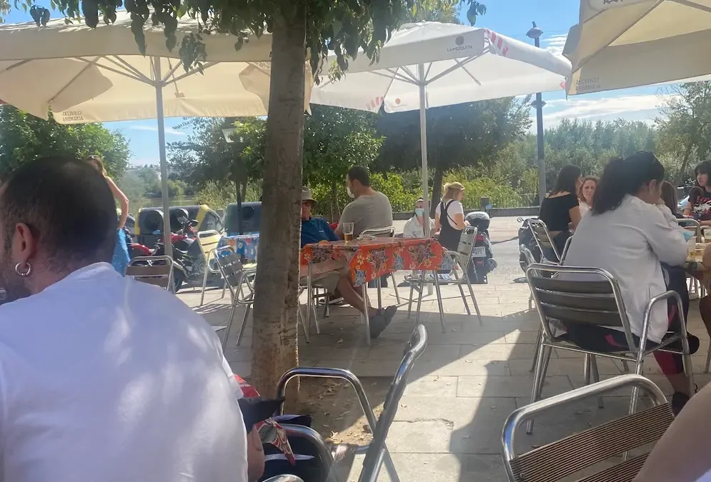 Bar Amapola interior with retro 1970s décor and views over the Guadalquivir