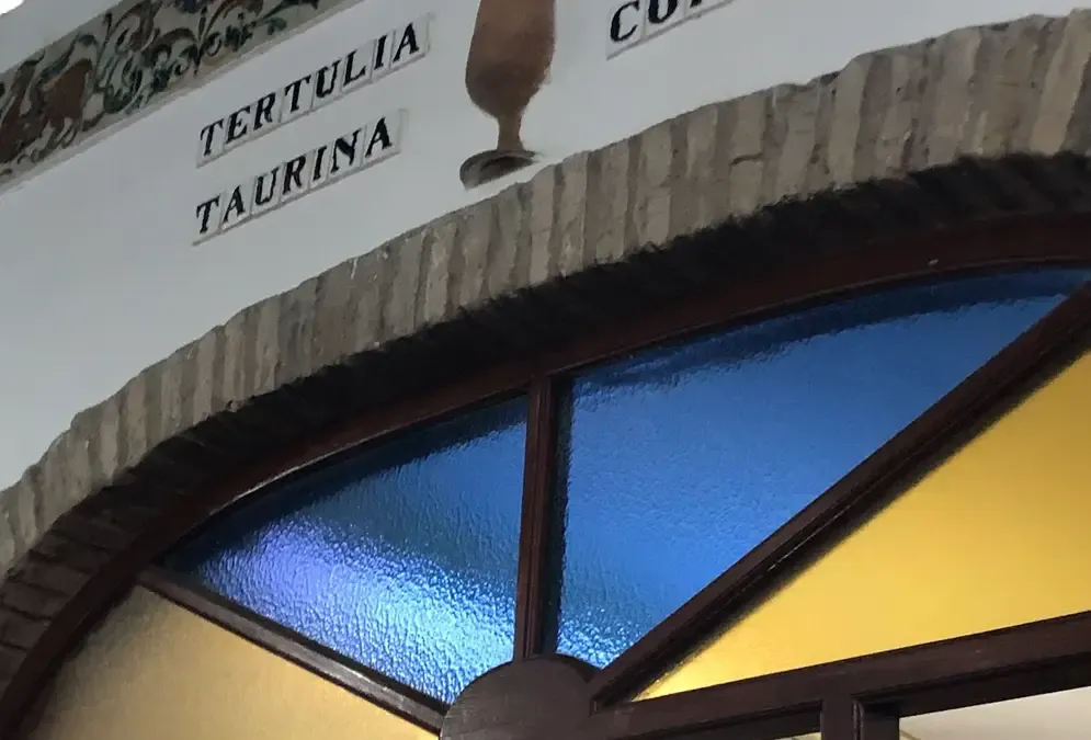 Authentic interior of Bodega Guzmán with Montilla-Moriles barrels and bullfighting décor