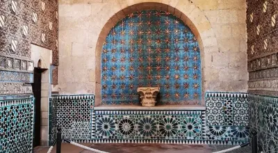 Gothic-Mudéjar ribbed vaults and intricate yesería plasterwork inside the Capilla de San Bartolomé, Córdoba