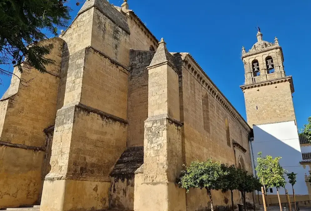 Iglesia de Santa Marina de Aguas Santas with its Romanesque façade and Manolete statue