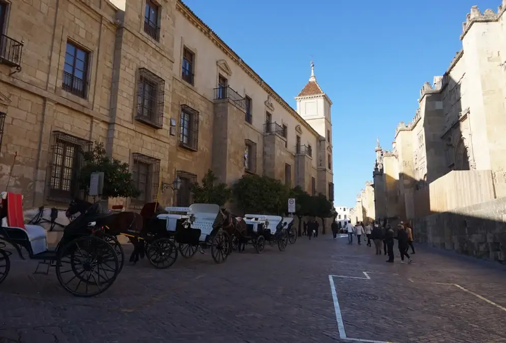 Baroque courtyard of the Palacio Episcopal de Córdoba with its monumental staircase