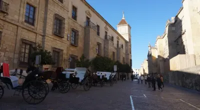 Baroque courtyard of the Palacio Episcopal de Córdoba with its monumental staircase