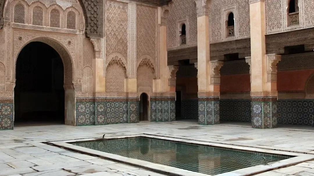 Interior of Hammam Al Ándalus with Moorish architecture, barrel vaulted ceilings and star-shaped stained glass