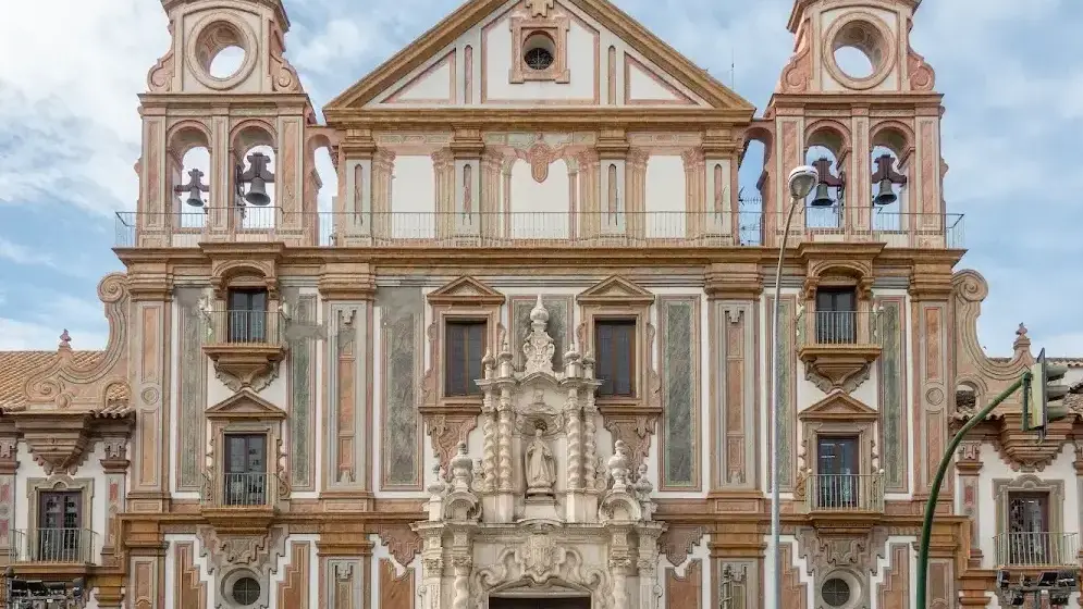 Baroque facade of the Palacio de la Merced with bell tower and inner courtyard