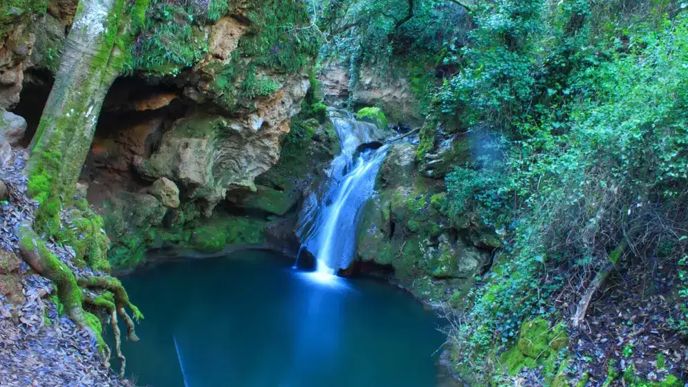 Natural swimming pool in the Sierra Morena near Córdoba with crystal-clear water